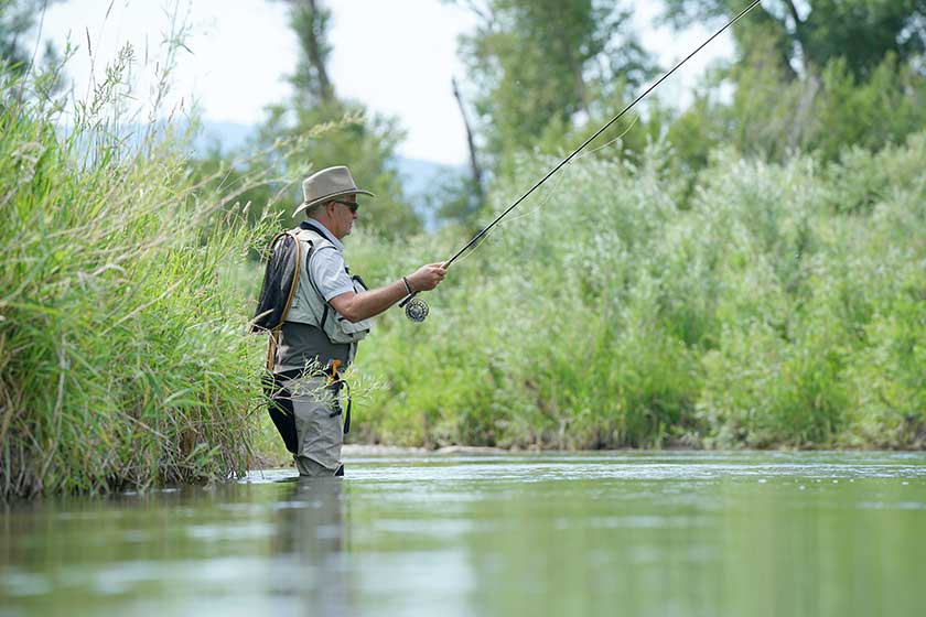 fisherman flyfishing river montana state