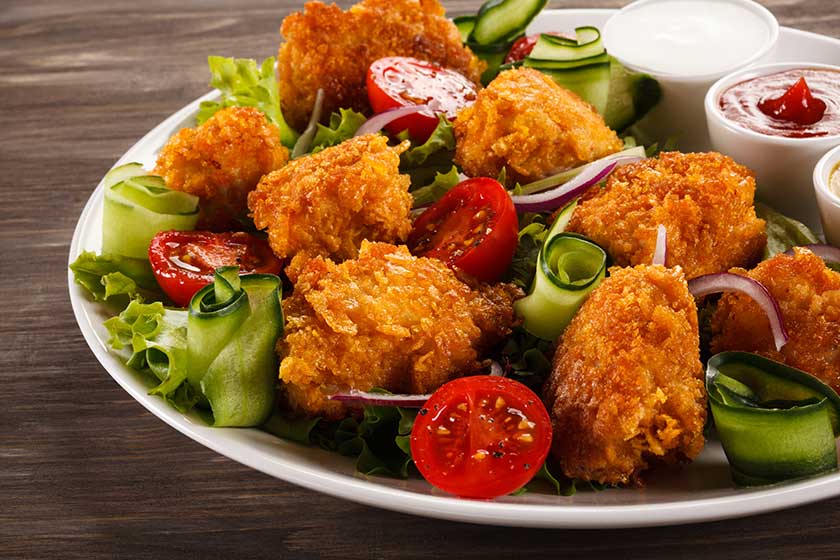 fried chicken nuggets vegetables