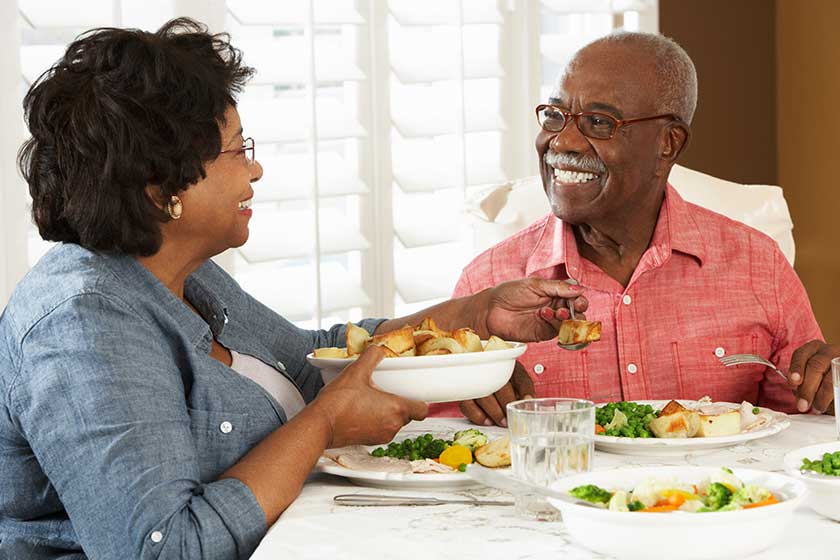 senior couple enjoying meal at home senior couple enjoying meal at home