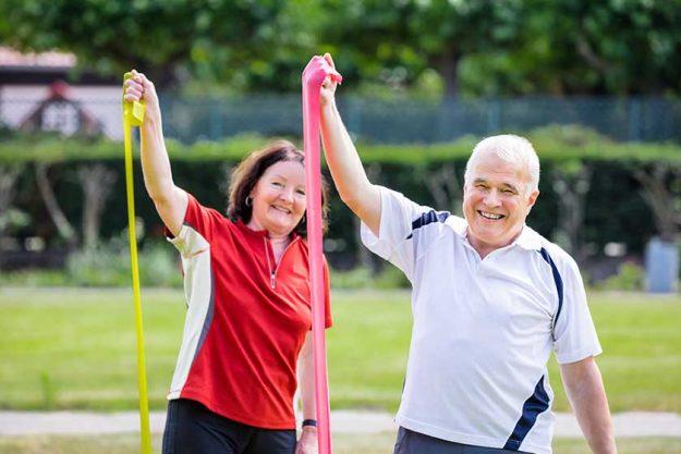 senior couple exercising senior couple exercising