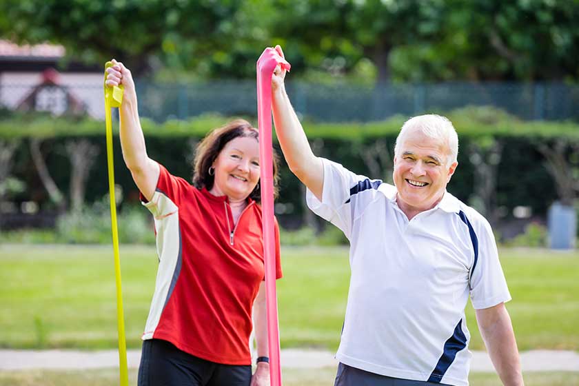 senior couple exercising senior couple exercising