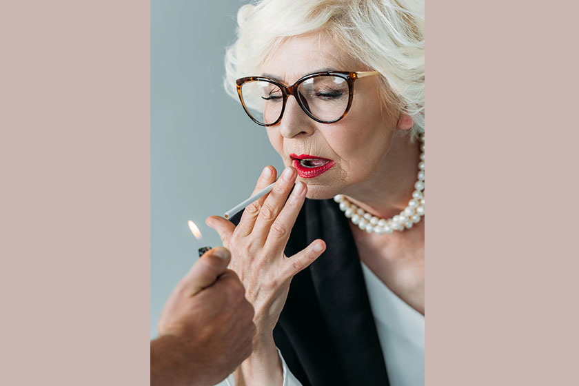 senior lady smoking cigarette