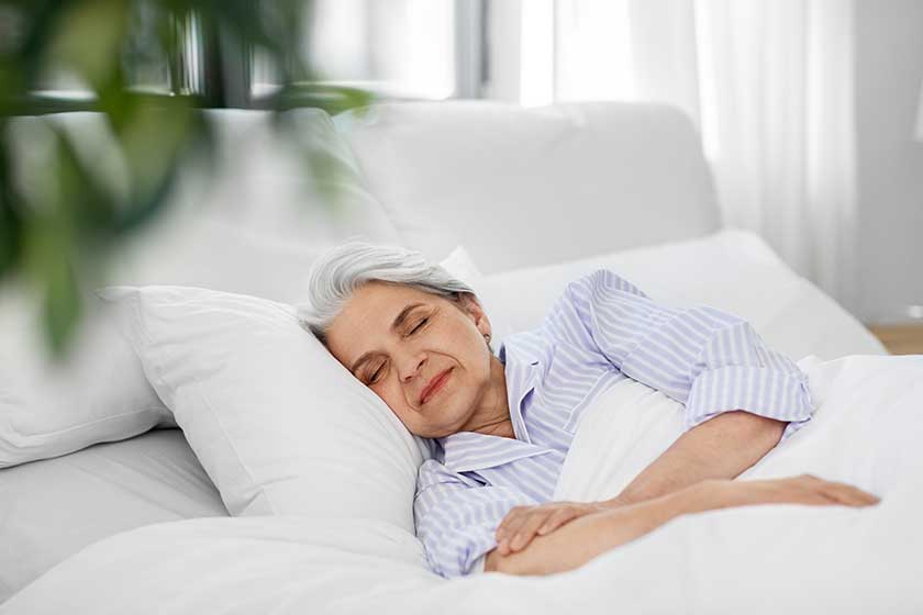 senior woman sleeping in bed at home bedroom senior woman sleeping in bed at home bedroom