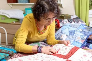 dressmaker working on her patchwork