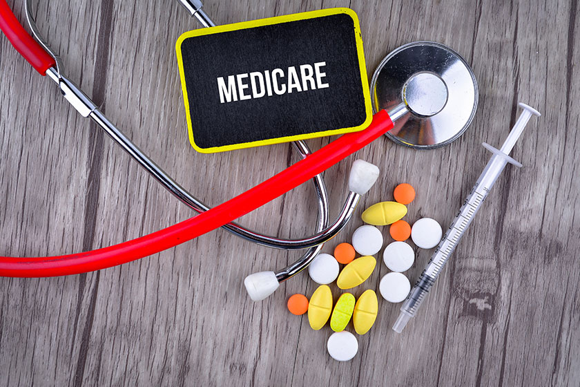 Pills syringe stethoscope text medicare