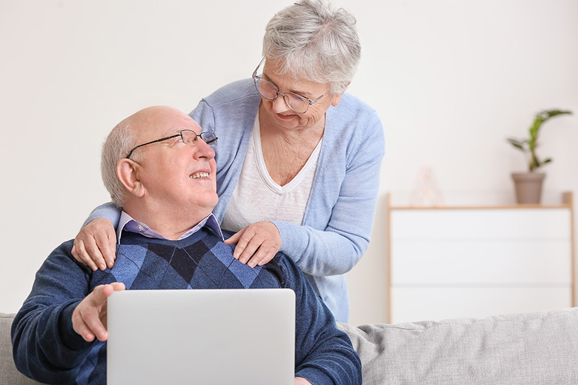 senior couple laptop home senior couple laptop home
