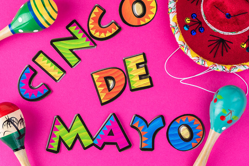 Cinco de mao bright background with sombrero and maracas Cinco de mao bright background with sombrero and maracas