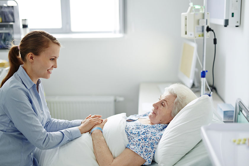 Girl visiting her sick grandmother