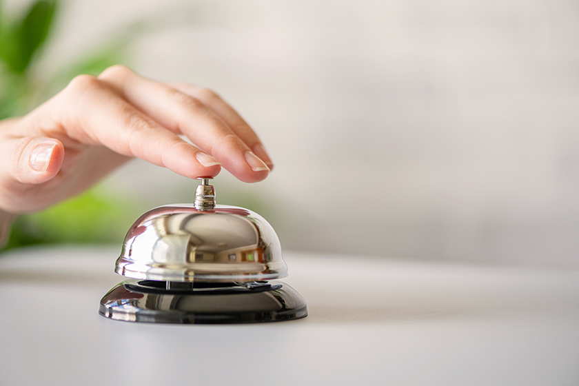 hand guest ringing silver bell hand guest ringing silver bell