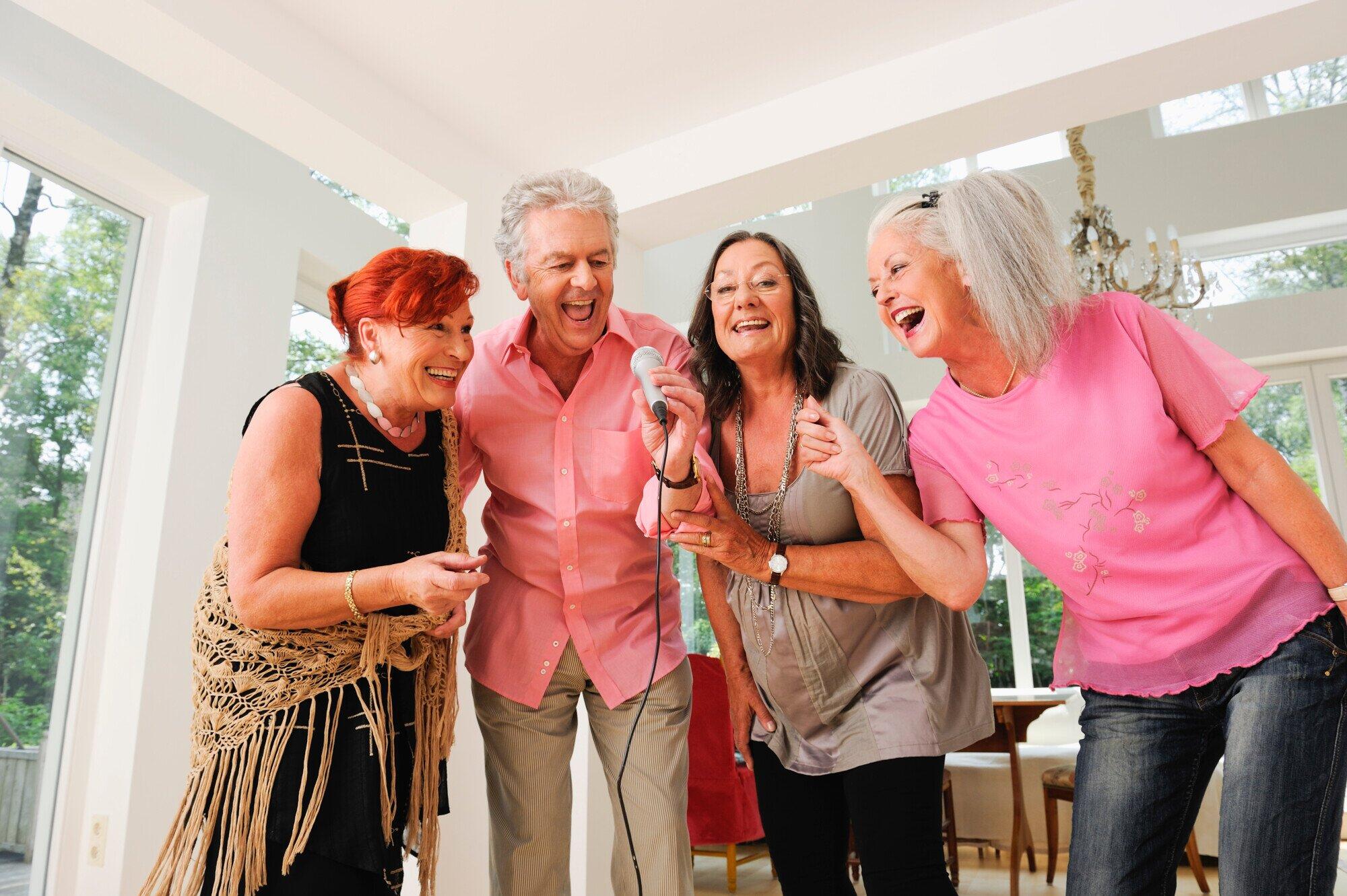 Seniors singing karaoke in hou
