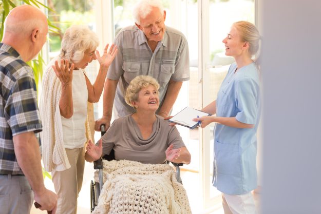 Young,Nurse,Saying,Goodbye,To,Elder,Woman,Leaving,Hospital,With Young,Nurse,Saying,Goodbye,To,Elder,Woman,Leaving,Hospital,With