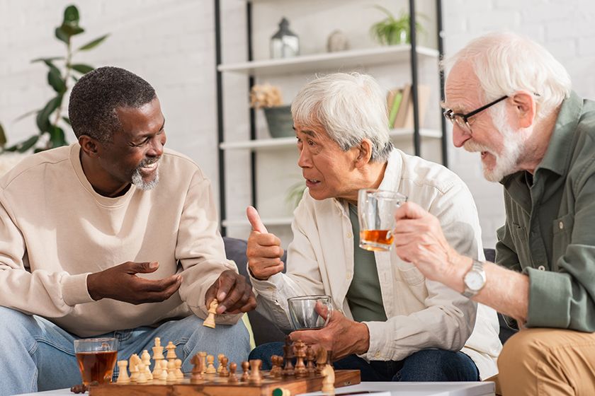 asian man holding tea showing sign asian man holding tea showing sign
