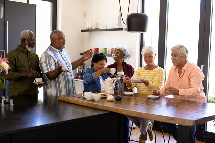 cheerful multiracial seniors talking enjoying coffee cheerful multiracial seniors talking enjoying coffee