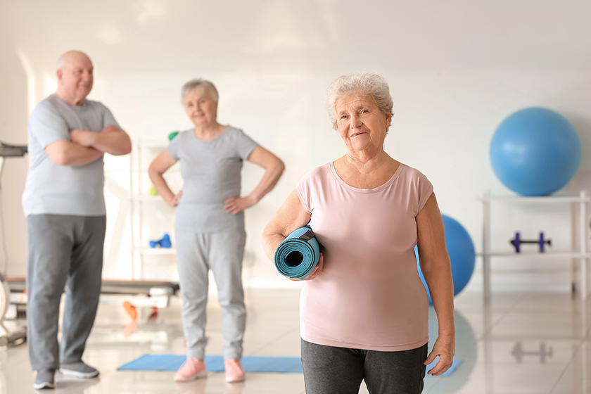 elderly woman yoga mat