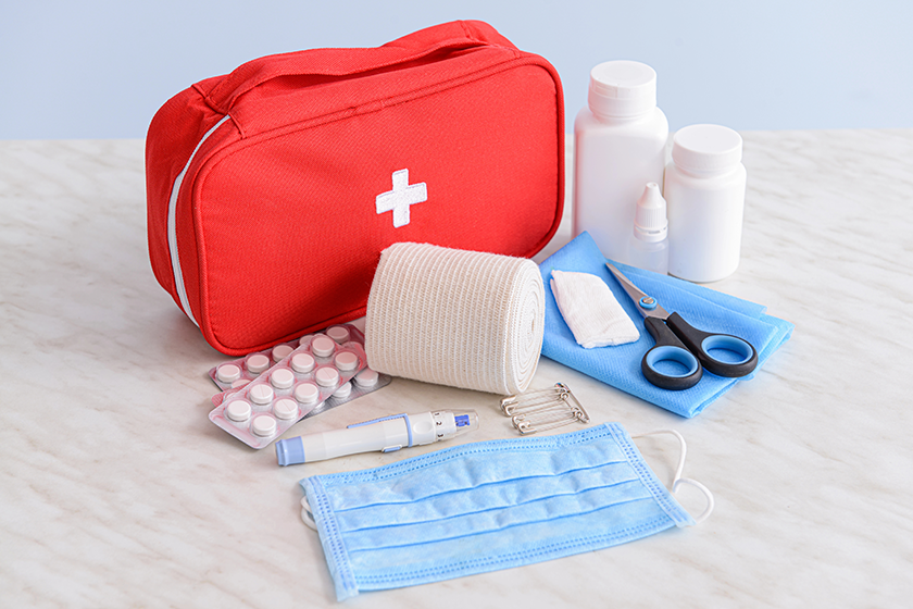 first aid kit on table