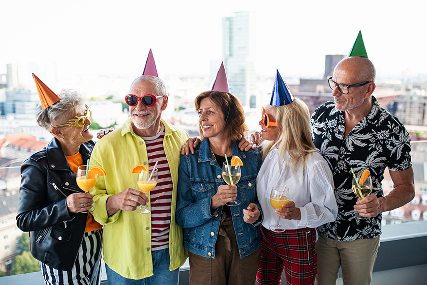 group of senior friends having party group of senior friends having party