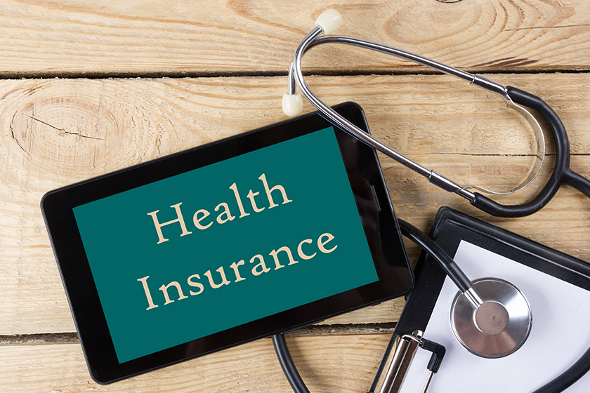 health insurance workplace of a doctor tablet stethoscope