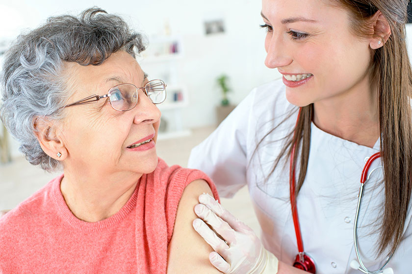 Senior woman getting a jab