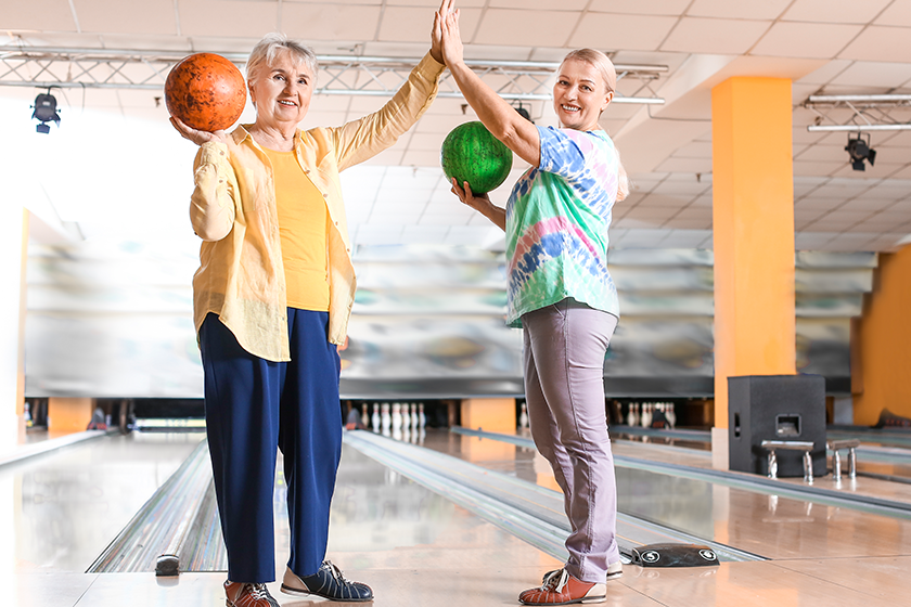 senior women playing bowling club