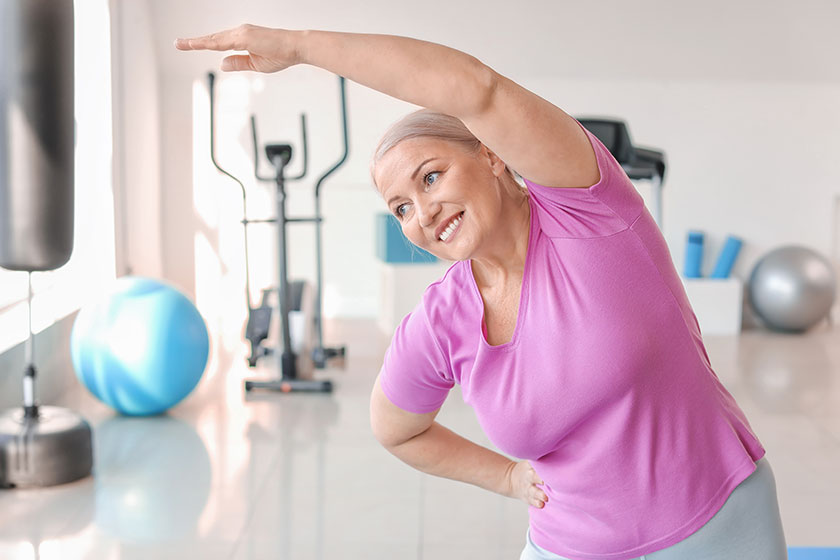 Sporty mature woman training gym Sporty mature woman training gym