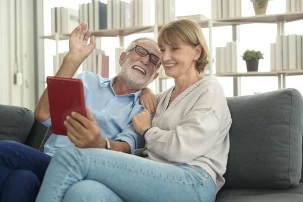 Caucasian happy seniors elderly are video calling to family or friends, relax at home, smiling healthy senior retired grandparents, older grandparent technology concept Caucasian happy seniors elderly are video calling to family or friends, relax at home, smiling healthy senior retired grandparents, older grandparent technology concept