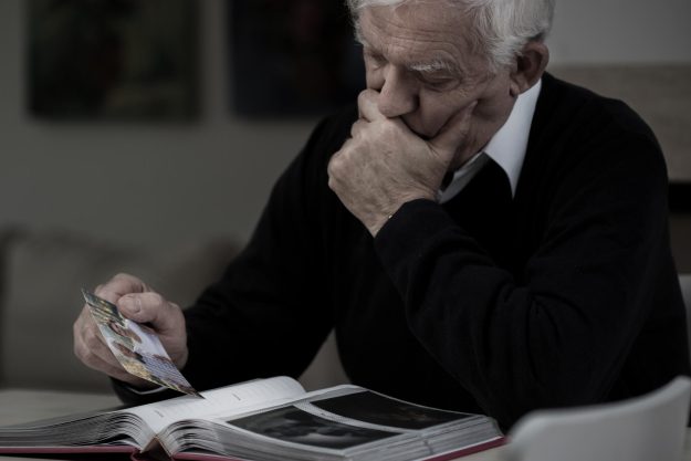 Senior,Sad,Man,With,Photo,Missing,His,Wife Senior,Sad,Man,With,Photo,Missing,His,Wife