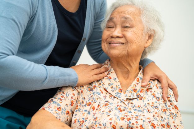 Caregiver help Asian elderly woman patient with love, care, enco