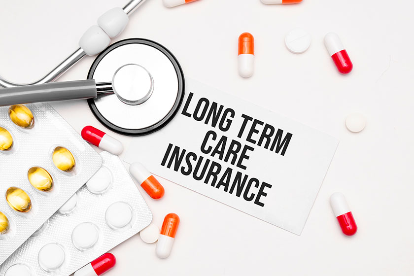 Stethoscope pills notebook long term care insurance word medical desk