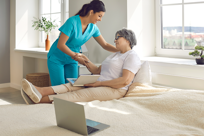 elderly woman patient and female nurse