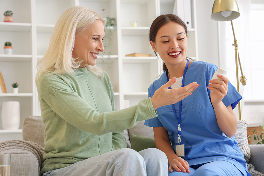 female doctor showing pills patient female doctor showing pills patient