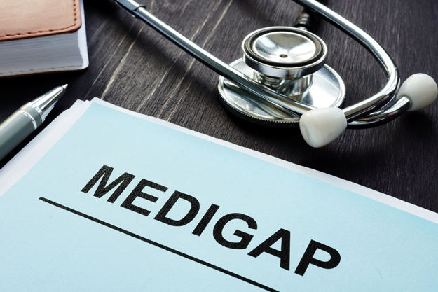 medigap medicare supplement health insurance papers and stethoscope medigap medicare supplement health insurance papers and stethoscope