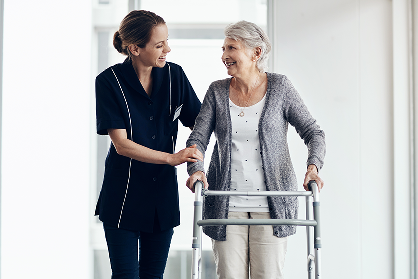 support caregiver senior woman walker assistance support caregiver senior woman walker assistance