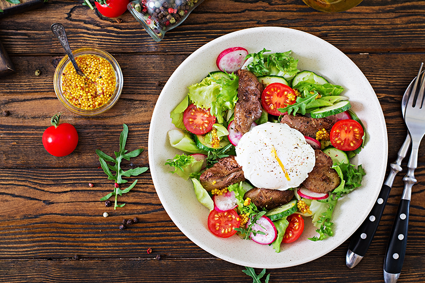 top view warm salad chicken liver radish cucumbers tomatoes egg top view warm salad chicken liver radish cucumbers tomatoes egg