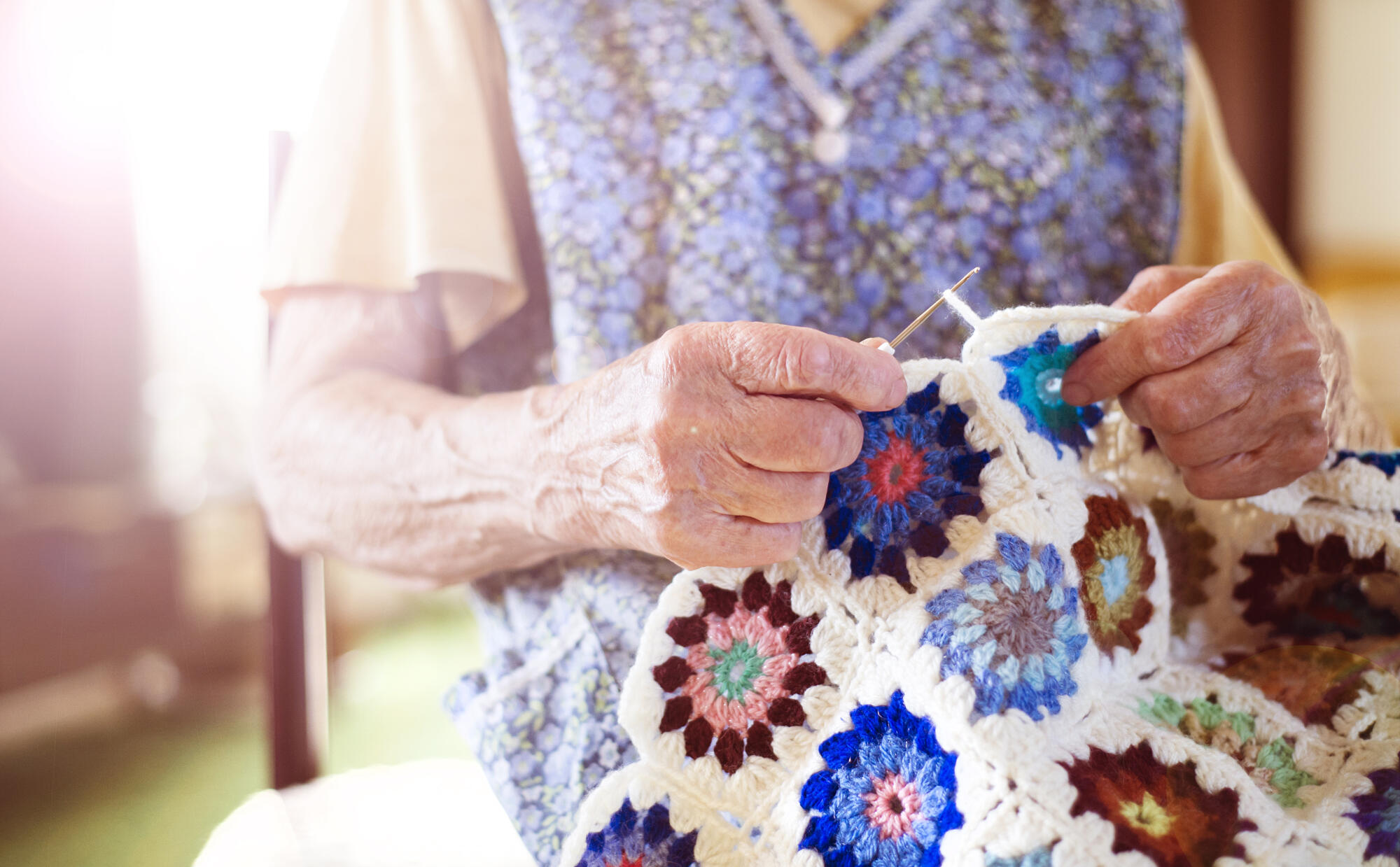 Old,Woman,Is,Knitting,A,Blanket,Inside,In,Her,Living Old,Woman,Is,Knitting,A,Blanket,Inside,In,Her,Living