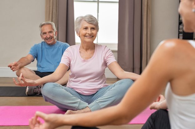 Senior,Couple,With,Trainer,Sitting,In,Lotus,Position,Meditating.,Instructor Senior,Couple,With,Trainer,Sitting,In,Lotus,Position,Meditating.,Instructor