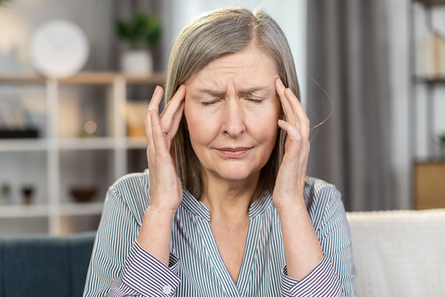 frustrated senior lady suffering strong