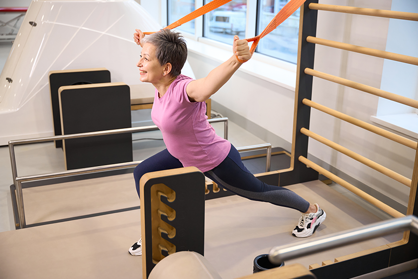 smiling middle aged caucasian woman wearing sportswear smiling middle aged caucasian woman wearing sportswear