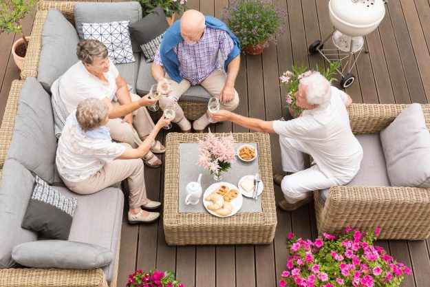 Top,View,Of,A,Wooden,Porch,With,Happy,Senior,Men