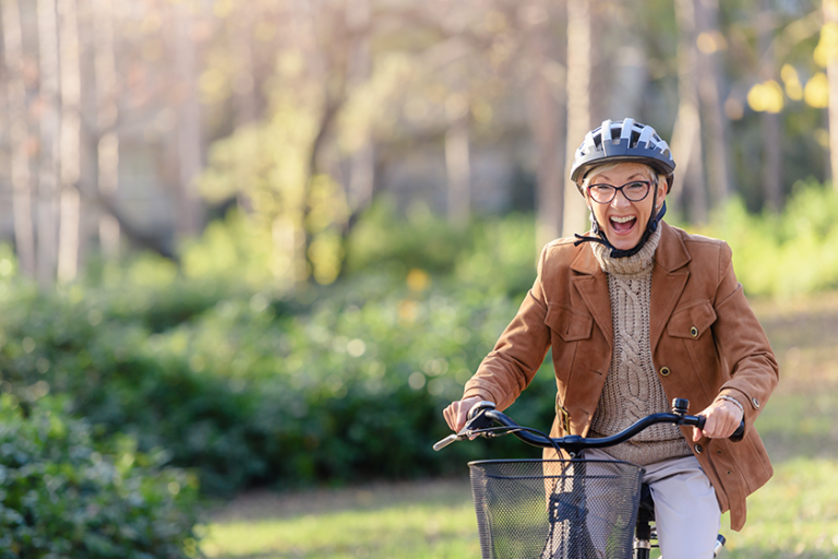 cheerful elderly woman riding bicycle cheerful elderly woman riding bicycle