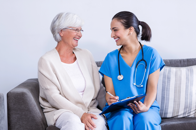 doctor and senior woman discussing