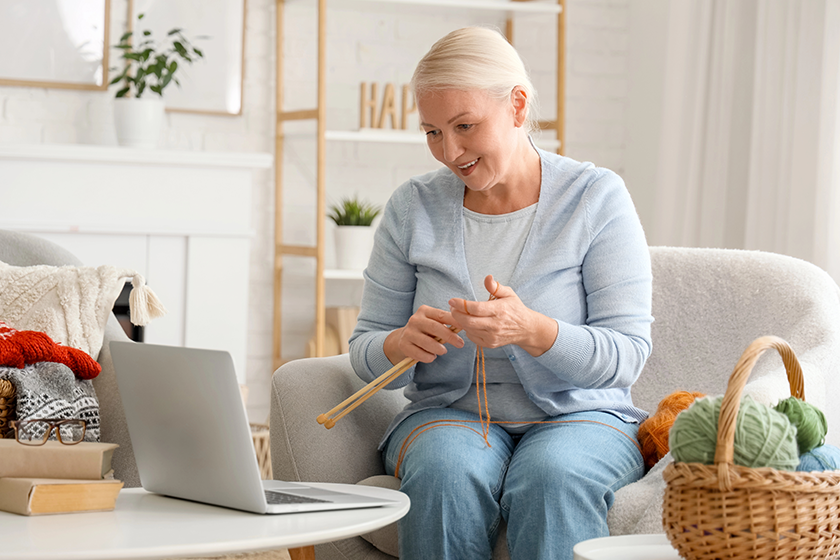 mature woman knitting