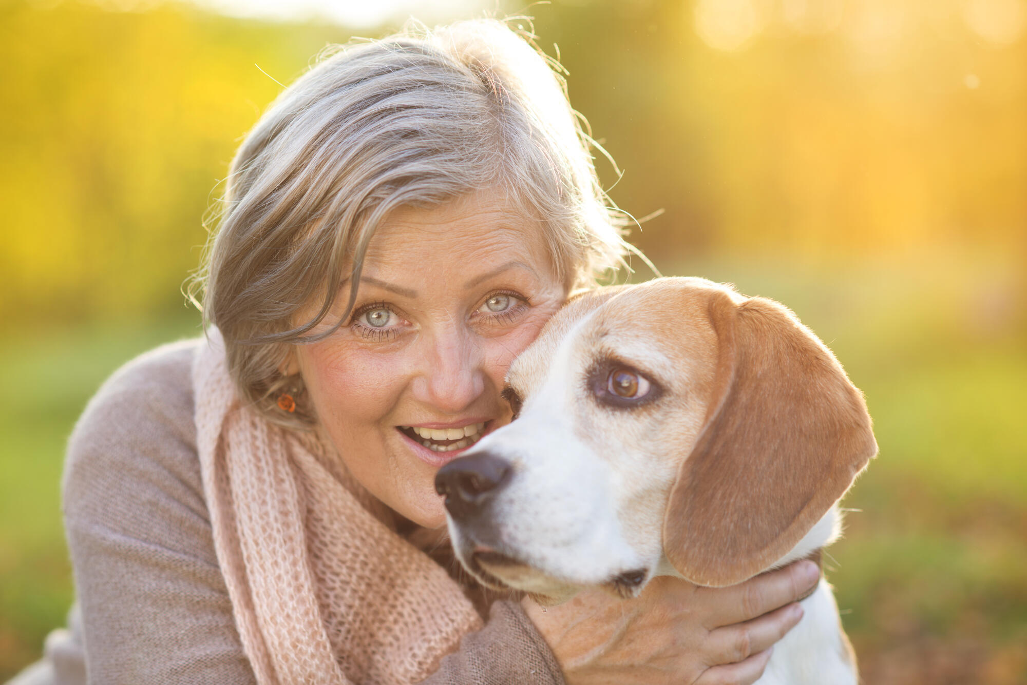 Senior,Woman,Hugs,Her,Beagle,Dog,In,Countryside Senior,Woman,Hugs,Her,Beagle,Dog,In,Countryside