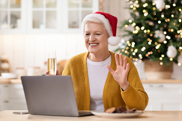 positive senior woman having video conference