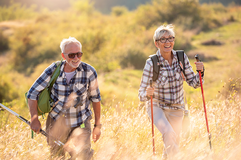 senior couple hiking mountains senior couple hiking mountains