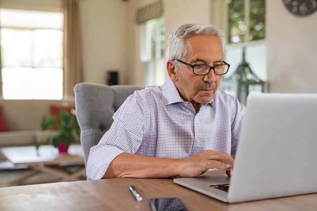 Senior,Man,Working,With,Laptop,At,Home.,Old,Man,Using Senior,Man,Working,With,Laptop,At,Home.,Old,Man,Using