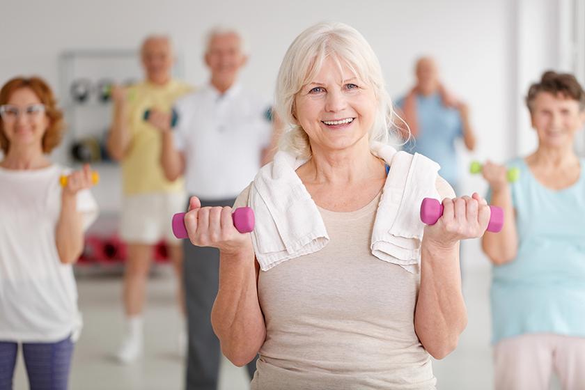 elders with dumbbells elders with dumbbells
