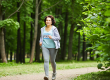 full body shot modern mature woman brown hair running