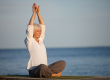 mature happy woman yoga meditation