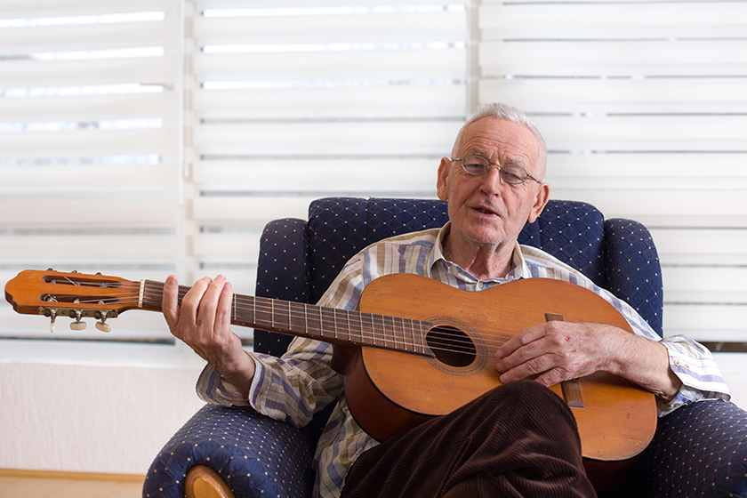 old man playing guitar old man playing guitar