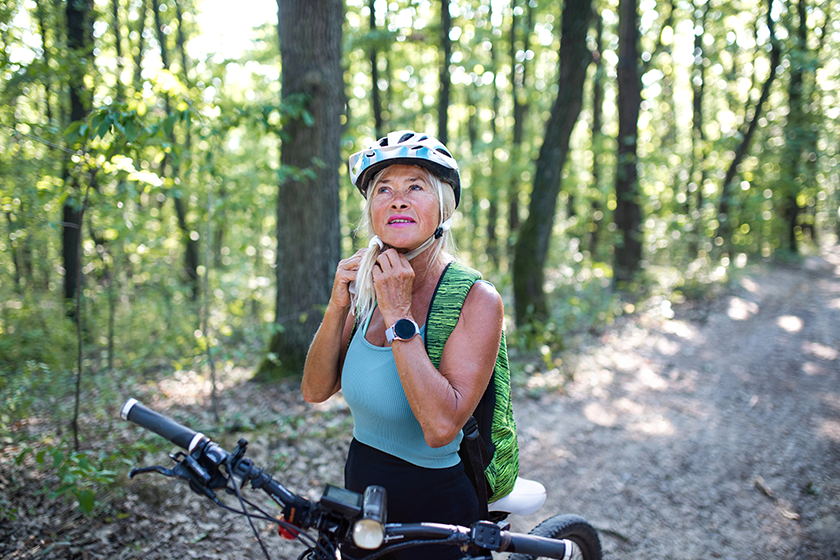 portrait of active senior woman biker
